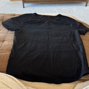 LULYLEMON Black Short-Sleeve with mesh workout top.